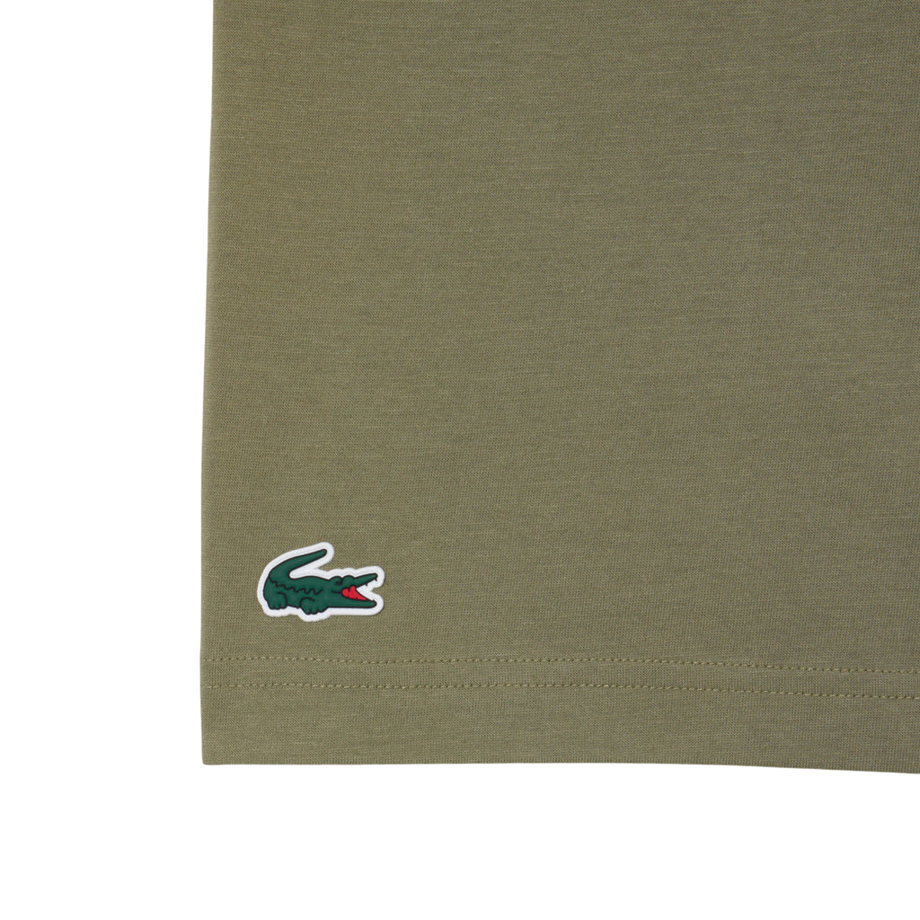 Pack Camiseta Lacoste Novak Djokovic Kaki y Gorra Negro