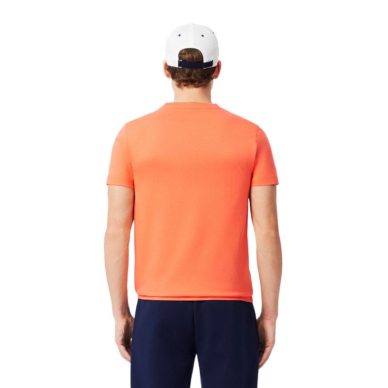 Pack Camiseta Lacoste Novak Djokovic Naranja y Gorra Blanco