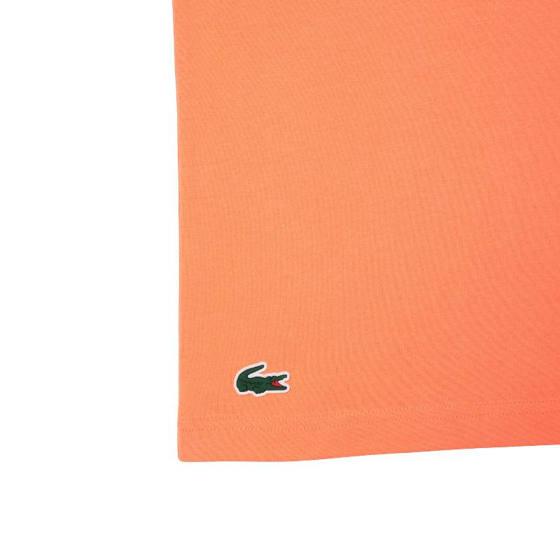 Pack Camiseta Lacoste Novak Djokovic Naranja y Gorra Blanco