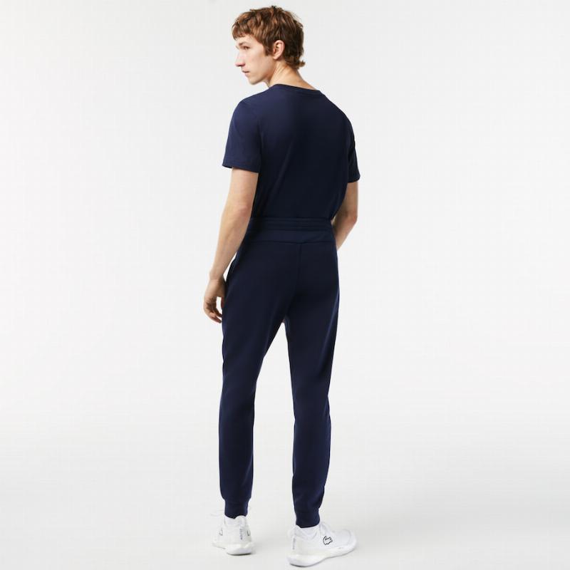 Pantalons sportifs de la marine de sport de lacoste