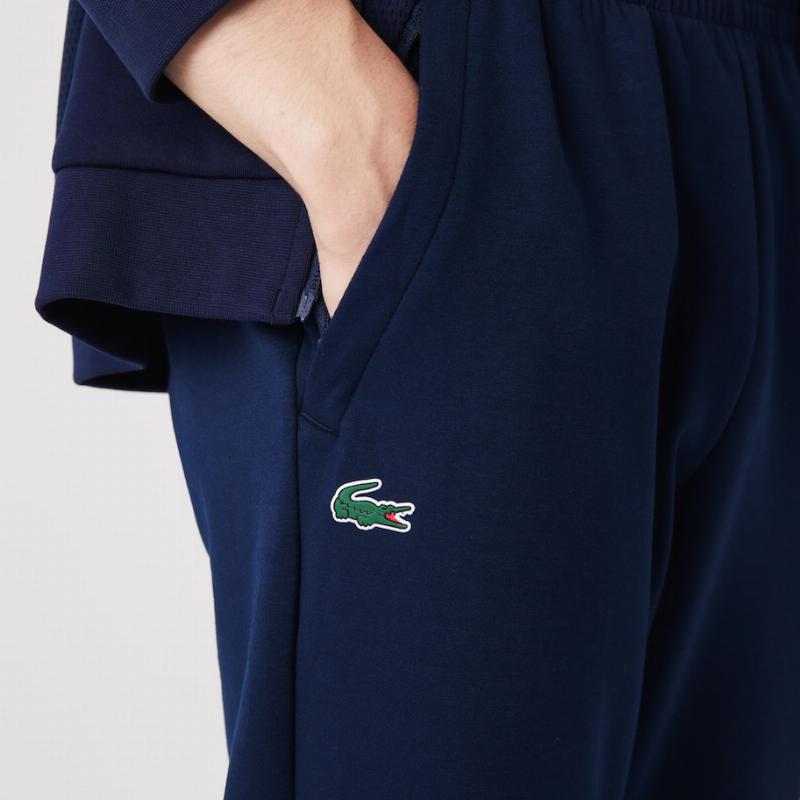 Pantalons sportifs de la marine de sport de lacoste