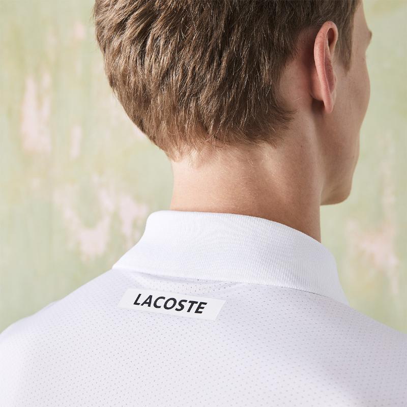 Pole Lacoste Sport Ultra Dry Marino Blanco