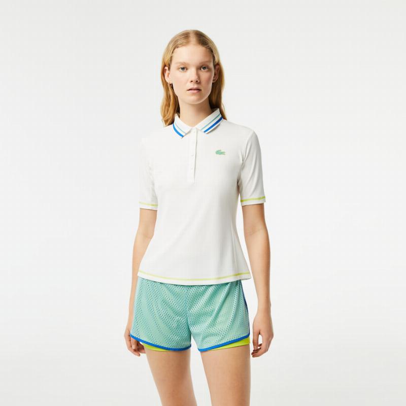 Polo Lacoste Ultra Dry Blanco Mujer